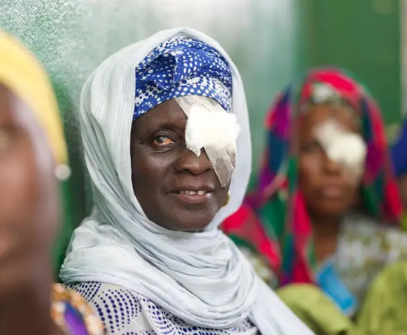 I can see my children's faces again. Amina lost her sight to bilateral cataracts over two years. A single morning at our eye camp in Mwanza changed that.